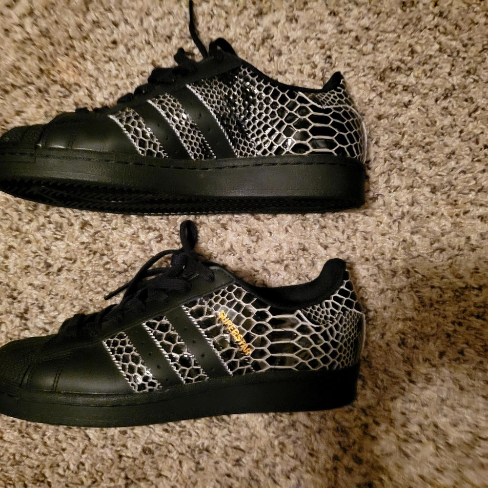adidas Black and White Sneakers with Gold Accents